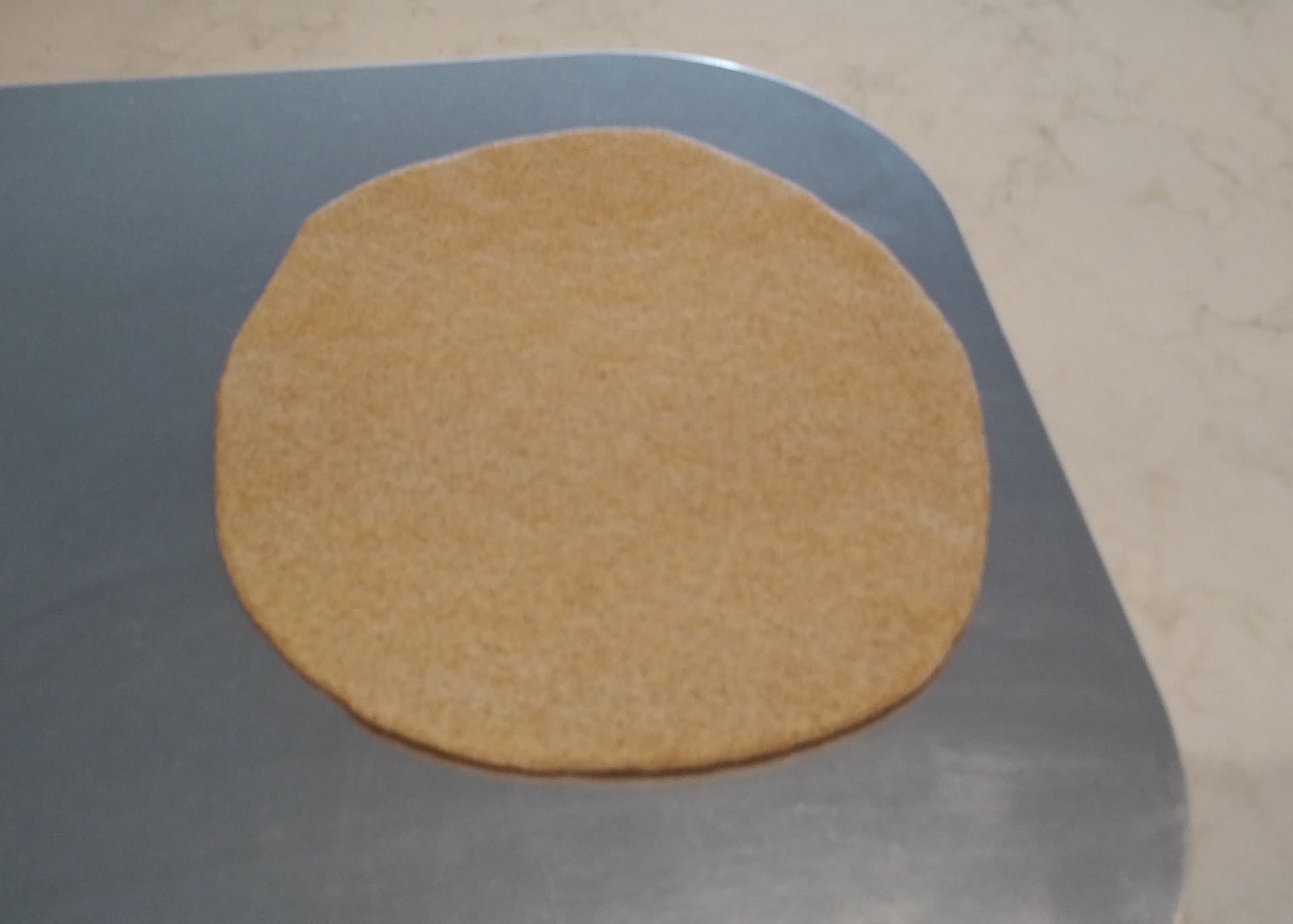 Sixth dough disc on peel